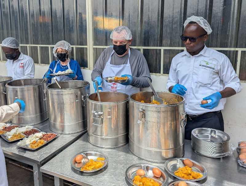 Tutator partners working with a community team